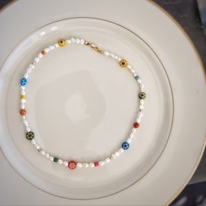 Freshwater pearl necklace with millefiore glass beads